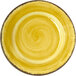 A yellow plate with a brown rim and a circular swirly design.