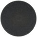 A black circular 3M stripping floor pad with a circle in the middle.