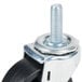 A 3 5/8" swivel stem caster with a black and metal wheel and brake.