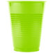A green plastic cup on a white background.