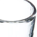 A Carlisle Mingle Tritan plastic juice glass with a handle.