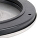 A round black and silver InSinkErator sink flange mounting assembly.