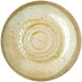 A close up of a Carlisle Adobe round melamine plate with a spiral design on it.