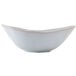 A white bowl with a curved edge and white rim.