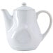 A white Tuxton china teapot with a lid and a white handle.