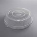 A clear plastic Visions round catering tray with a high dome lid.