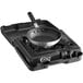 A black Choice 3-piece portable cooking kit with a black frying pan on a black stove.