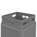 A close-up of a gray Commercial Zone PolyTec waste container with a lid.