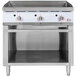 A stainless steel Cooking Performance Group gas griddle with thermostatic controls and a cabinet base.