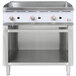 A stainless steel Cooking Performance Group gas griddle with manual controls and a cabinet base.