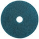 A white circle on a blue 3M 5300 floor pad.
