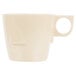 A tan melamine cup with a handle.