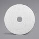 A white circular 3M Super Polishing floor pad