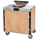 A Lakeside mobile cooking cart with an induction burner and a pan on top.