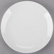 A white Arcoroc porcelain salad plate with a white rim.