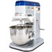 A Vollrath countertop mixer with a blue bowl on top.