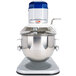 A silver Vollrath countertop mixer with a blue lid.
