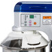 A Vollrath countertop mixer with a blue and white bowl attached.
