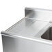 An Eagle Group stainless steel underbar sink with three bowls, two 13" drainboards, and a splash mount faucet.