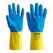 A pair of blue and yellow Cordova rubber gloves with a yellow band.