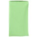 A folded Intedge seafoam green cloth napkin.