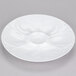 A CAC super white china oyster plate with a flower design.