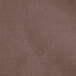 A close-up of a brown 100% polyester fabric.