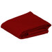 A folded red Intedge rectangular table cover.