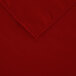 A red square polyester table cover with a hemmed edge.