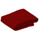 A red folded Intedge table cover.