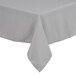 A gray square tablecloth with a hemmed edge on a table.