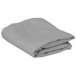 A stack of folded grey cloth table covers on a white background.
