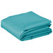 A stack of teal rectangular Intedge table covers.