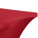 A crimson Snap Drape Contour table cover on a table with a folded edge.