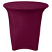 A burgundy Snap Drape spandex table cover on a round table.