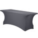 A charcoal Snap Drape Contour spandex table cover with curved edges on a rectangular table.