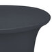 A black Snap Drape contour table cover on a round table.