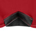 The red fabric corner of a Snap Drape Contour round spandex table cover.