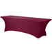 A burgundy Snap Drape spandex table cover on a table.