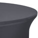 A round table with a charcoal Snap Drape spandex cover.