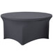 A round black table with a Snap Drape charcoal spandex cover.