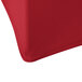 A crimson Snap Drape spandex table cover on a table.