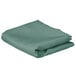 A folded seafoam green rectangular cloth table cover.