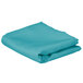 A folded teal rectangular table cover on a white background.