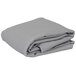 A stack of folded gray rectangular Intedge table covers.