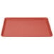 A raspberry cream rectangular tray with a red surface.