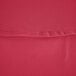 A close up of a hot pink hemmed fabric.