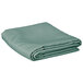 A folded seafoam green Intedge rectangular cloth table cover.