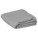 A folded grey rectangular Intedge table cover.