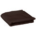 A folded brown Intedge round table cover.
